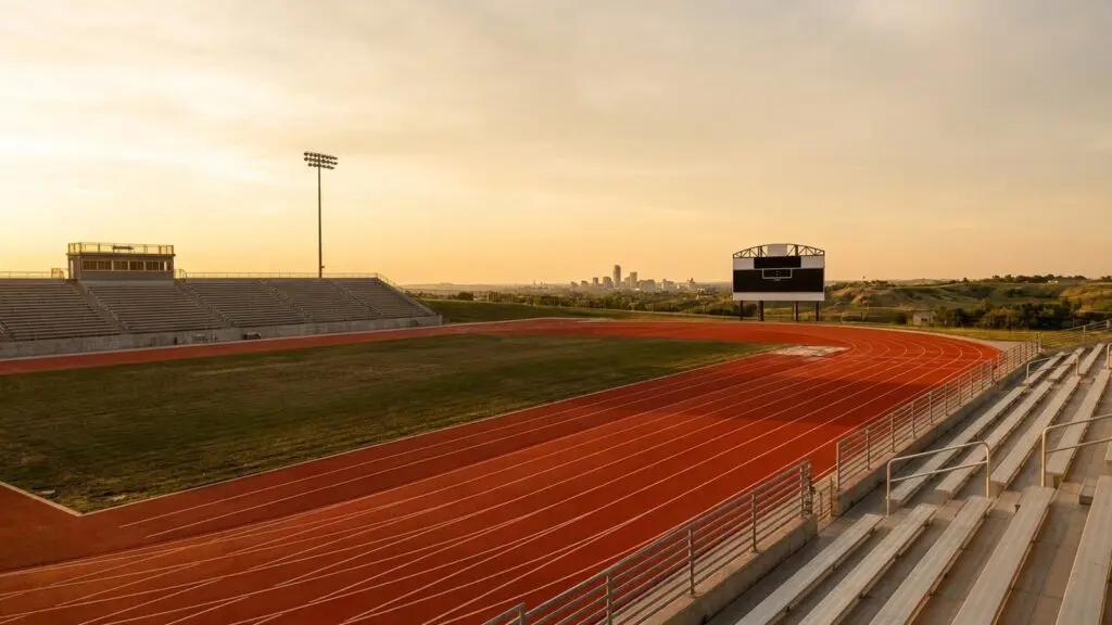 Empty outdoor track and field lanes at golden hour in Omaha, Nebraska